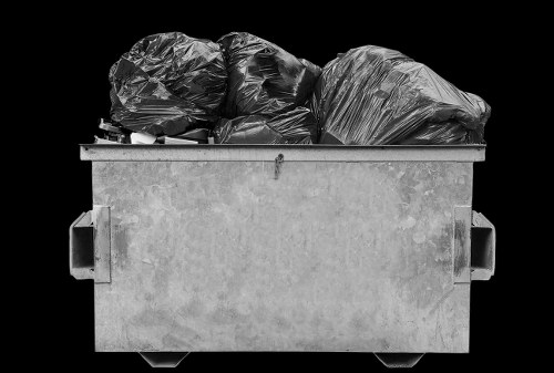 Walthamstow commercial waste crew loading recycling bins